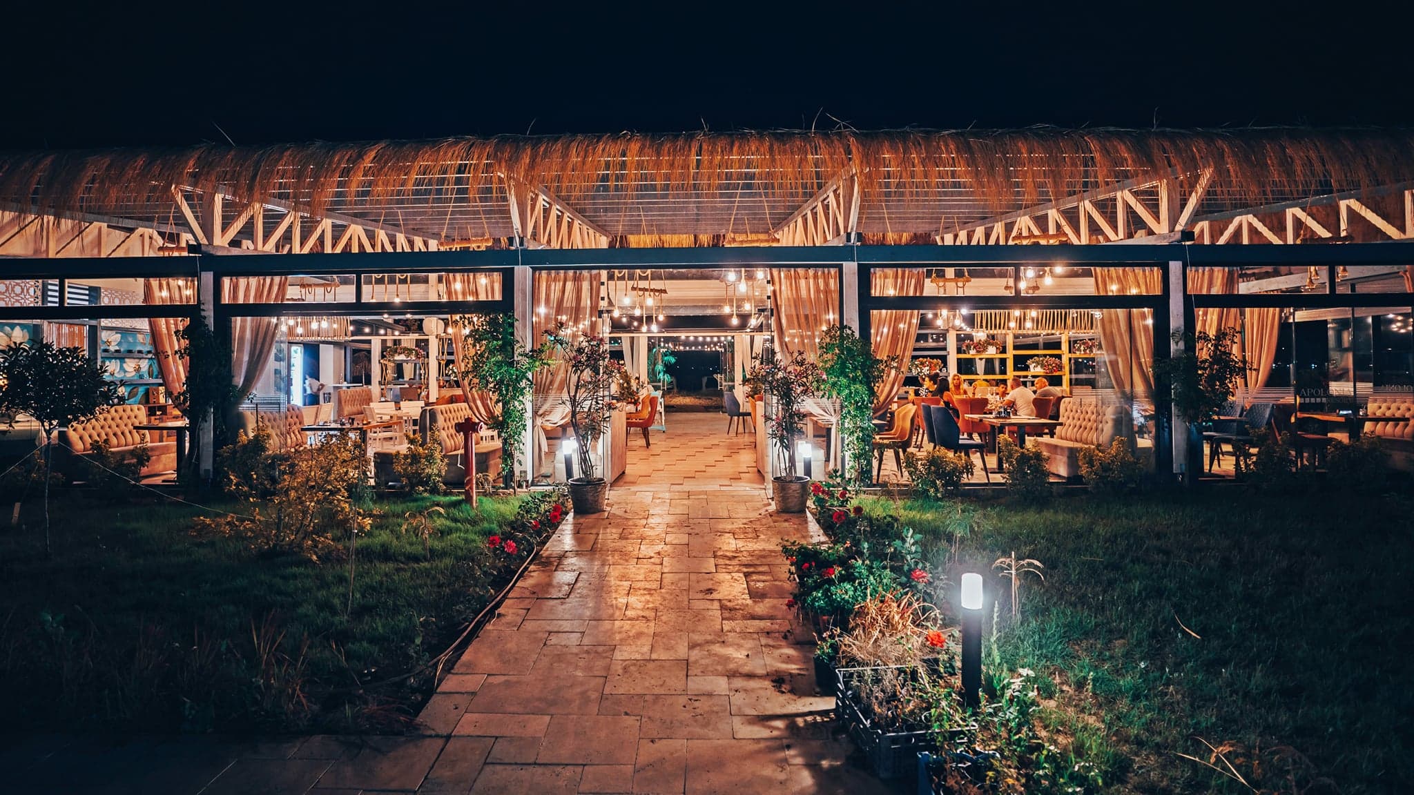 Boutique seaside resort terrace at dusk representing a hotel marketing account audit